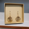 SunChild earring. A vermeil fan with the tiny face of a sunchild in the centre.