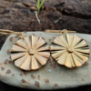 SunChild earring. A vermeil fan with the tiny face of a sunchild in the centre.